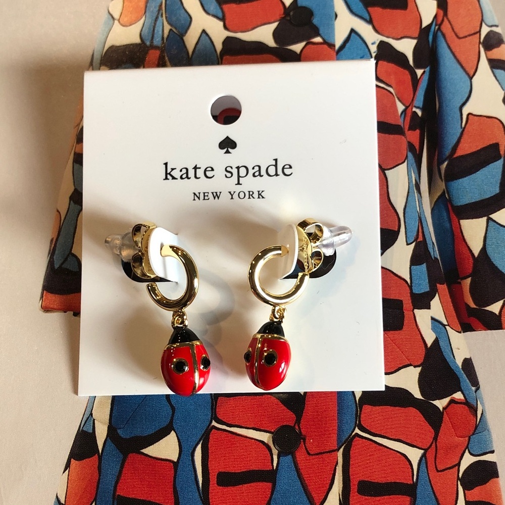 Authentic kate spade New with tag red and gold ladybug drop earrings.